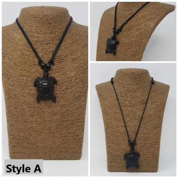 Black turtle necklace deals