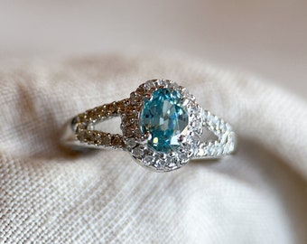 Vintage 1990s Blue Topaz & Diamond Halo Ring, 10k White Gold - Timeless Sustainability • Vintage Jewelry