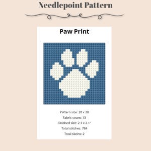 May include: Digital download needlepoint pattern featuring a white paw print on a blue background. The pattern size is 28 x 28, with a finished size of 2.1 x 2.1 inches. The text "Paw Print" is displayed at the top.