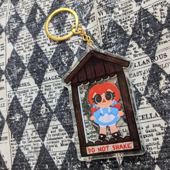haunted doll box | Raggedy Ann acrylic shaker keychain