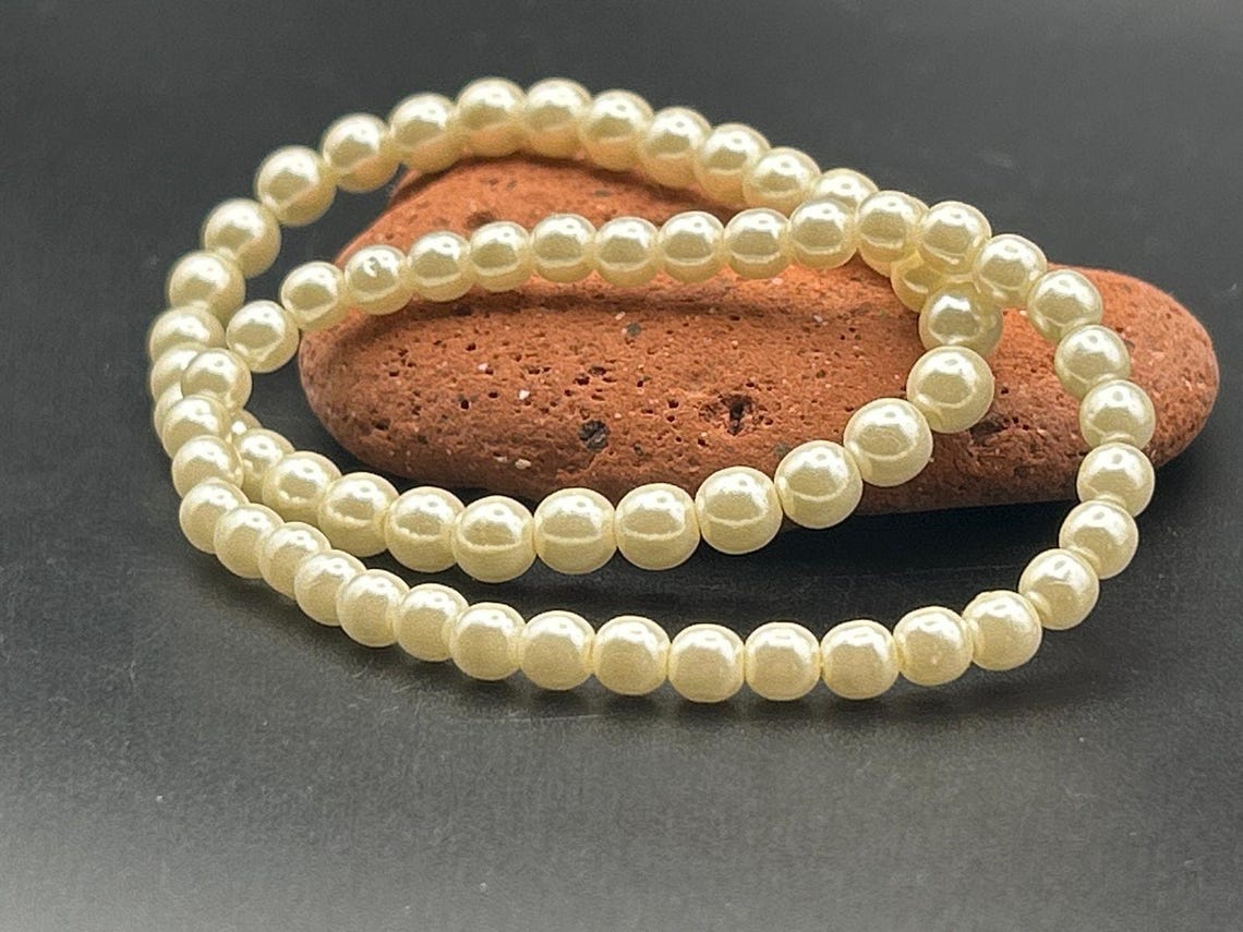 Vintage 1980s Faux Pearl Stretch Bracelets Set of 2 | Retro Stackable Ivory, photo 2 of 3
