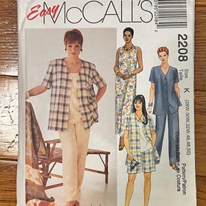 May include: McCall's sewing pattern envelope featuring illustrations of women's clothing designs. The envelope includes the text "Easy McCall's" and "Womanstyle". The designs include a jacket, pants, and shorts.