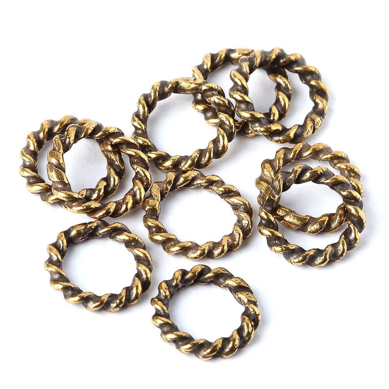 Twisted jump ring bronze jewelry findings twist rope ring band Etsy
