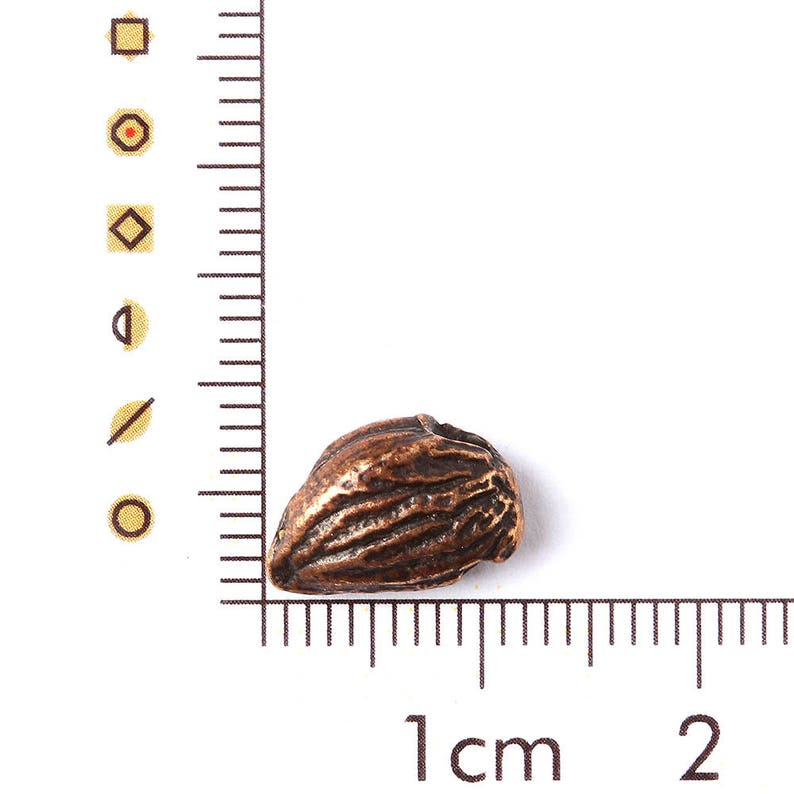 Small seed spacer bead charm bronze jewelry findings set 10 pieces 1560 10 Designed and made by Anna Bronze