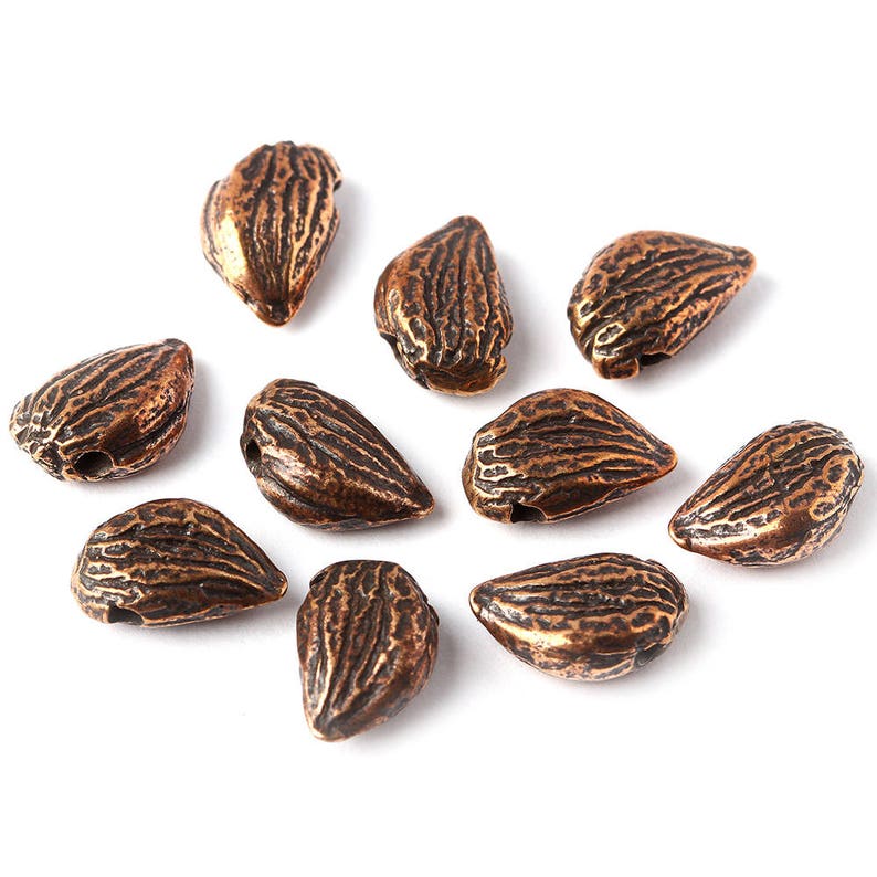 Small seed spacer bead charm bronze jewelry findings set 10 pieces 1560 10 Designed and made by Anna Bronze