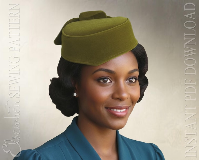 May include: An olive green pillbox hat with a structured, flat top and a small bow detail at the back. The text "Elsewhen Sewing Pattern" and "INSTANT PDF DOWNLOAD" is visible on the left and right sides of the image respectively.