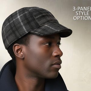 May include: A dark gray plaid newsboy cap with a short brim. The cap has a 3-panel style and is made of a textured fabric. The text "3-PANEL STYLE OPTION" is visible in the background.
