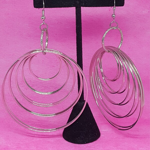 Far Out big silver orbit like earrings moveable jewelry circles in motion earrings very unique hippie boho punk rocker awesome vintage gift