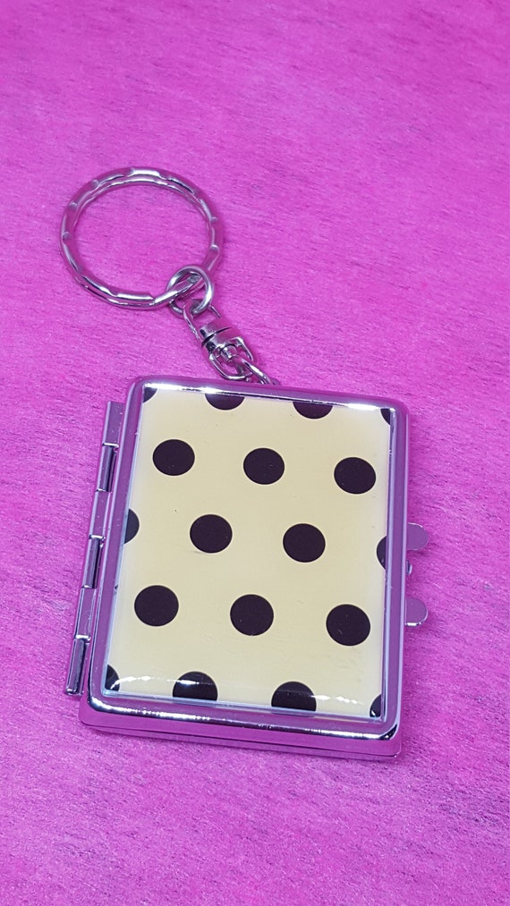 Awesome black & white patent polka dot locket keyc