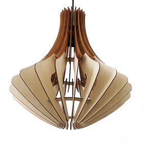 May include: A modern, geometric pendant light fixture made of layered wood. The light features a natural wood color with a darker brown accent at the top. The design is open and airy, with a unique, artistic shape.