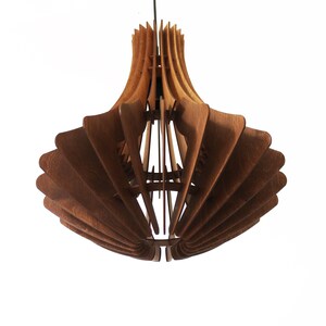 May include: A wooden pendant light fixture with a unique, layered design. The fixture is made of multiple wooden slats arranged in a fan-like pattern, creating a warm, inviting glow. The light hangs from a black cord, perfect for a modern home.
