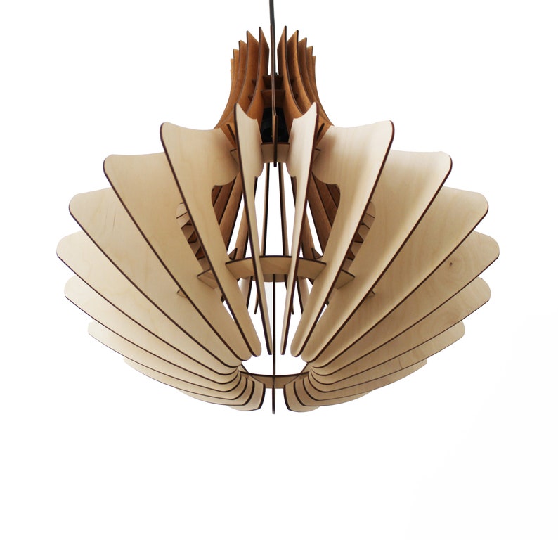 May include: A wooden pendant light fixture with a layered, fan-like design. The light fixture is made of light-colored wood with a darker wood accent at the top. The design is geometric and modern, suitable for home decor.