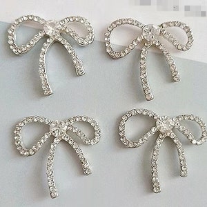 4 Noeuds décoratifs en strass au dos plat (25 x 23 mm) LT-38