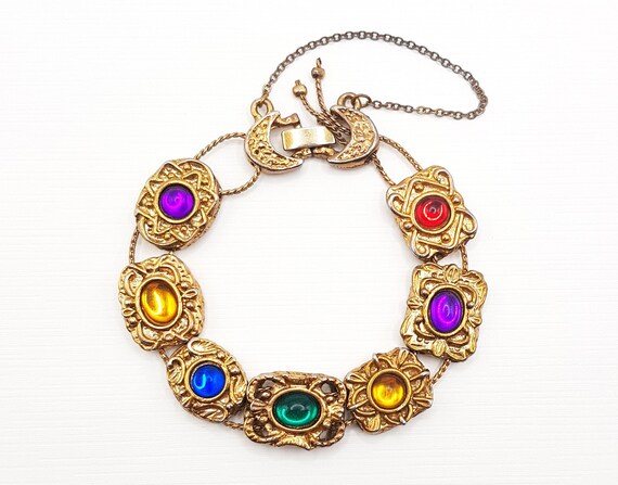 Metal link outlet charm bracelet