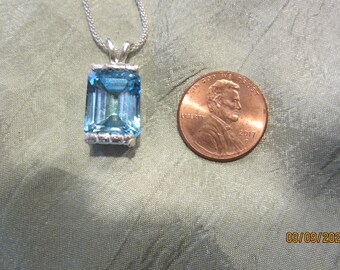 Exciting Blue Topaz Pendant