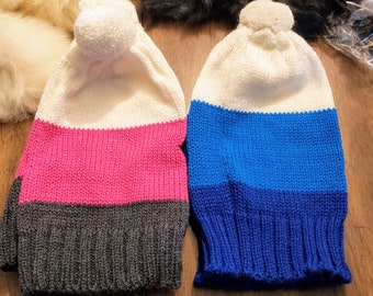 Alpaca hat with tricolor stripes and a white pom pom on top