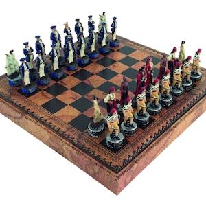May include: A detailed chess set with pieces depicting historical figures in blue and red uniforms. The chessboard has a brown and black checkered pattern, set on a decorative base with a map design. The pieces are intricately designed.