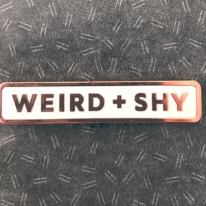 WEIRD + SHY — enamel pin