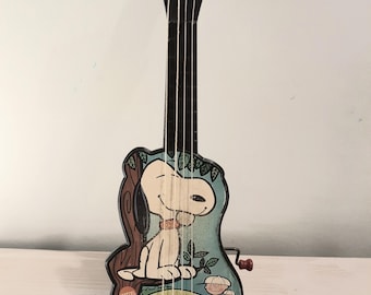 Guitarra de cuerda vintage de Snoopy
