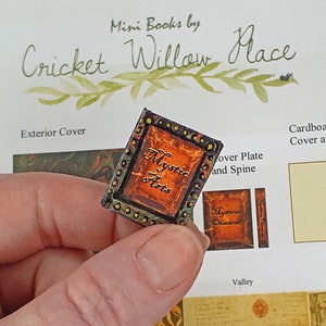 Miniature Book, Magical herbal Grimoire, 1 inch, Pages open with ancient illustrations and illegible text