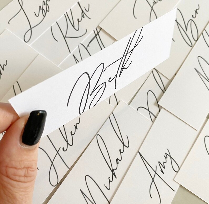 Flat place cards with blank ink per card