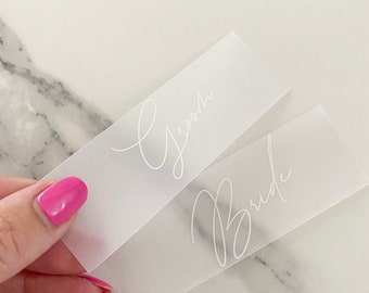 Vellum place cards with white ink
