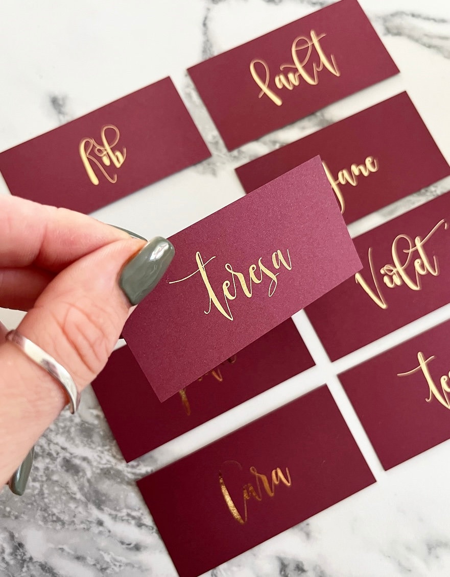 Burgundy Foiled flat place cards per card spiro font