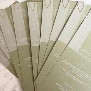 Sage green wedding menu with or without place card on the day table plan