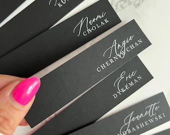 Black place cards with white ink