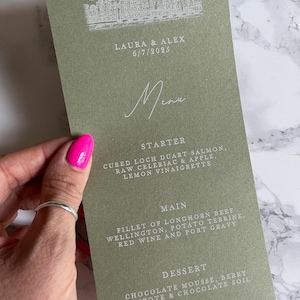 Sage green wedding menu with venue sketch without place card on the day table plan