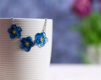 Handmade Forget-me-not necklace, translucent. Comes in a gift box.