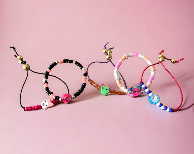 Set of 5 brightly coloured kids bracelets, fun bracelets for kids 2 to 11 years of age to wear.