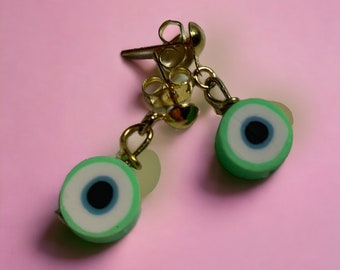 Fun kids polymer clay evil eye stud earrings.