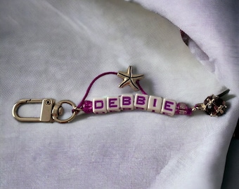 Personalized name/birthstone key chains.