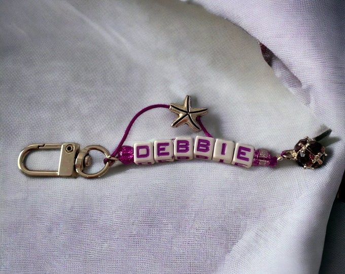 Personalized name/birthstone key chains.