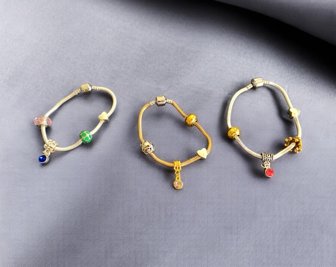 Pandora style bracelets  or anklets with non replaceable charms,  available in Gold or Silver,  great gift for her