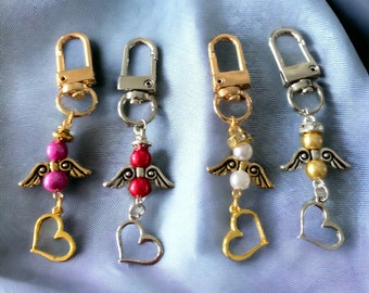 Guardian Angel Keychain with Pearls and a Heart Charm.