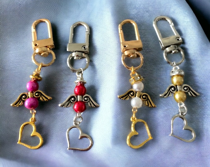 Guardian Angel Keychain with Pearls and a Heart Charm.