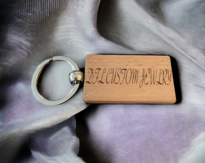 Handmade wooden personalized keychain,  done on a laser burning machine.