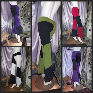 May include: Five pairs of bell bottom pants with contrasting color panels. The pants are black with a contrasting panel of purple, red, green, white, and black.