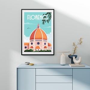 Może przedstawiać: Czarny plakat w ramie z vintage'owym wzorem plakatu podr&oacute;żniczego przedstawiający kolorową ilustrację Duomo we Florencji we Włoszech. Tekst na plakacie brzmi "Florencja, Włochy".