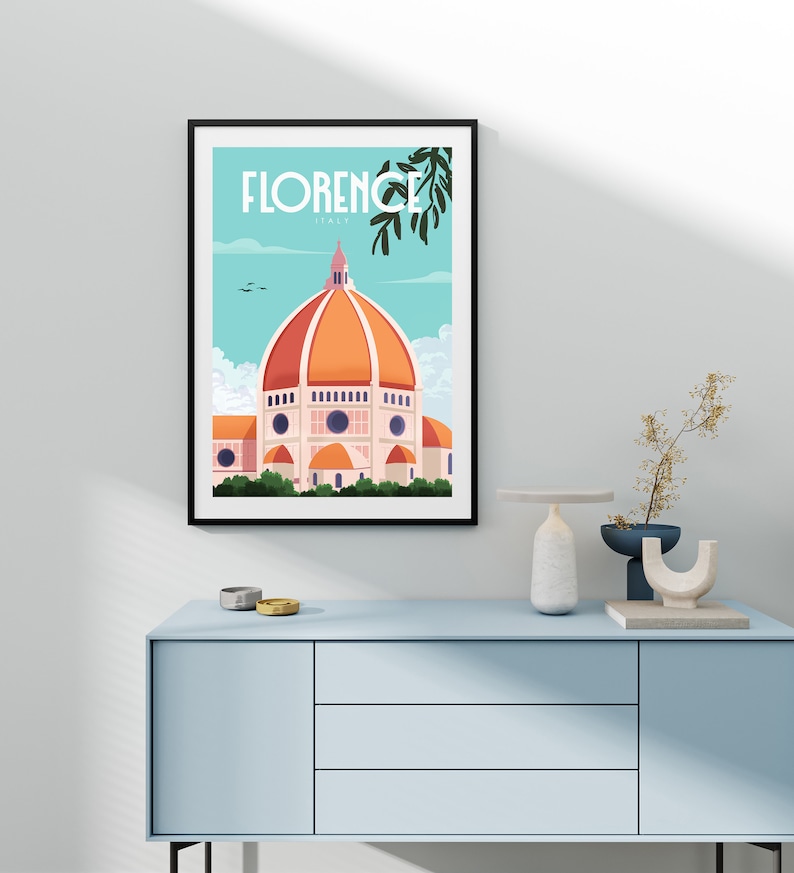 Może przedstawiać: Czarny plakat w ramie z vintage'owym wzorem plakatu podr&oacute;żniczego przedstawiający kolorową ilustrację Duomo we Florencji we Włoszech. Tekst na plakacie brzmi "Florencja, Włochy".