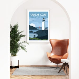 May include: A framed poster with a blue and white illustration of a lighthouse on the Oregon Coast. The poster reads "Oregon Coast, Yaquina Head Lighthouse". The poster is hanging on a white wall in a room with a brown leather armchair and a small wooden side table.