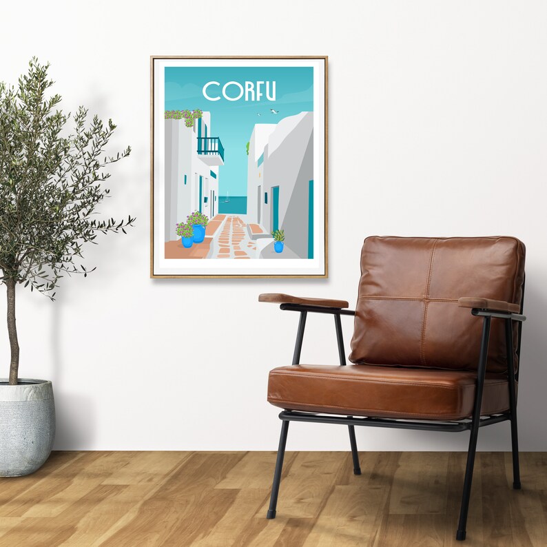 May include: A framed illustration of a white building with a blue door and a blue sky with the word "CORFU" in white text.