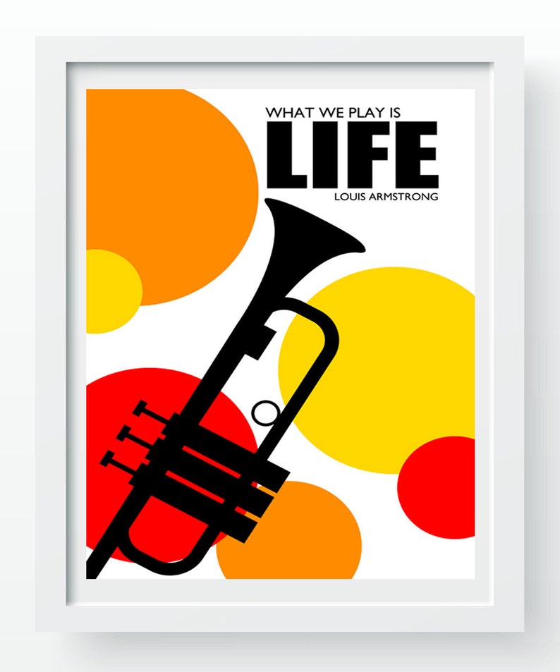 May include: A black and white illustration of a trumpet with the text "What we play is LIFE" and "Louis Armstrong" on a white background with red, orange, and yellow circles.