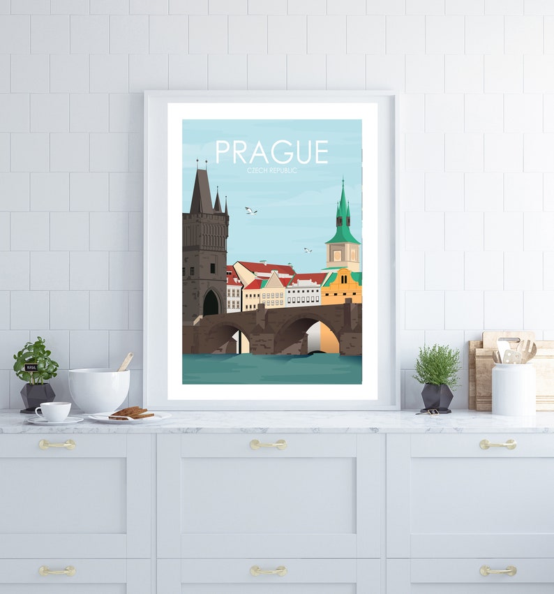 May include: A colorful illustration of Prague, Czech Republic, featuring the Charles Bridge with its iconic towers and arches. The illustration is set against a blue sky with white clouds.