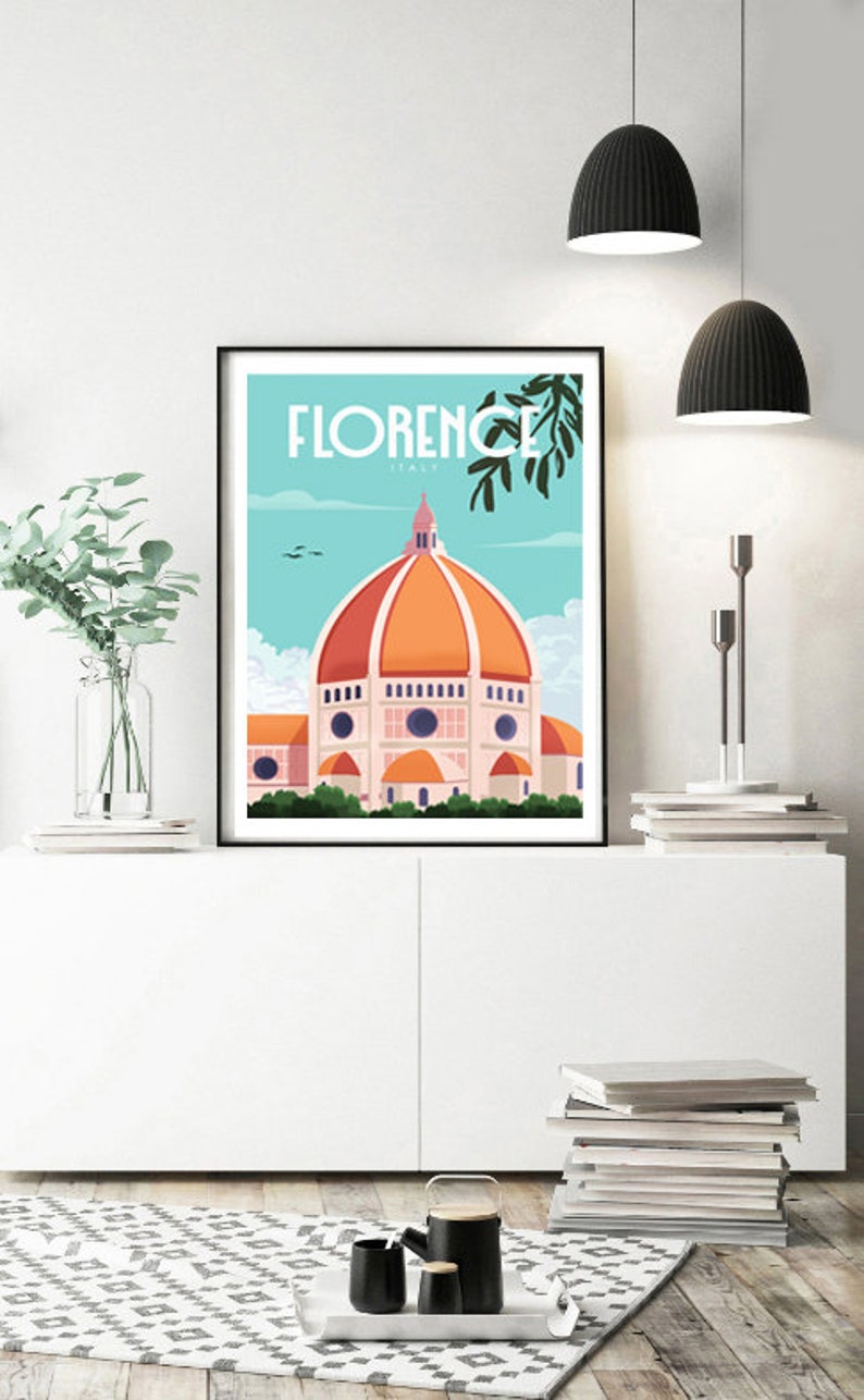 Może przedstawiać: Czarny plakat w ramie z niebieskim i białym tłem przedstawiający rysunkową ilustrację Duomo we Florencji we Włoszech. Plakat zawiera napis "FLORENCE ITALY" u g&oacute;ry.