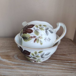 Queen Anne sugar bowl and milk jug with leaf design. Made in England. Bone China