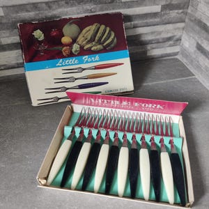 Vintage little forks in original box. Cocktail forks 1950s
