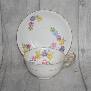 Victoria C&E Teacup and Saucer. Home decor. Floral Teacup and Saucer
